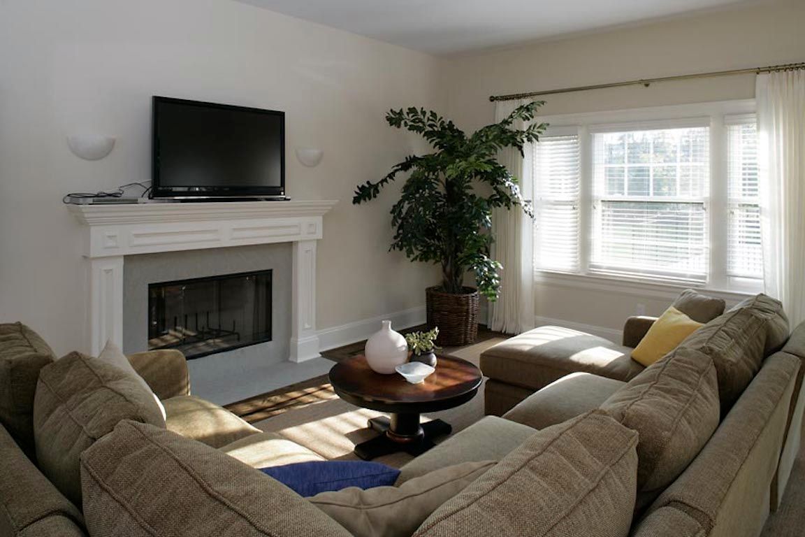 Undisclosed Address Quogue, NY 11959 - Photo 2 of 19 a living room with furniture fireplace and window