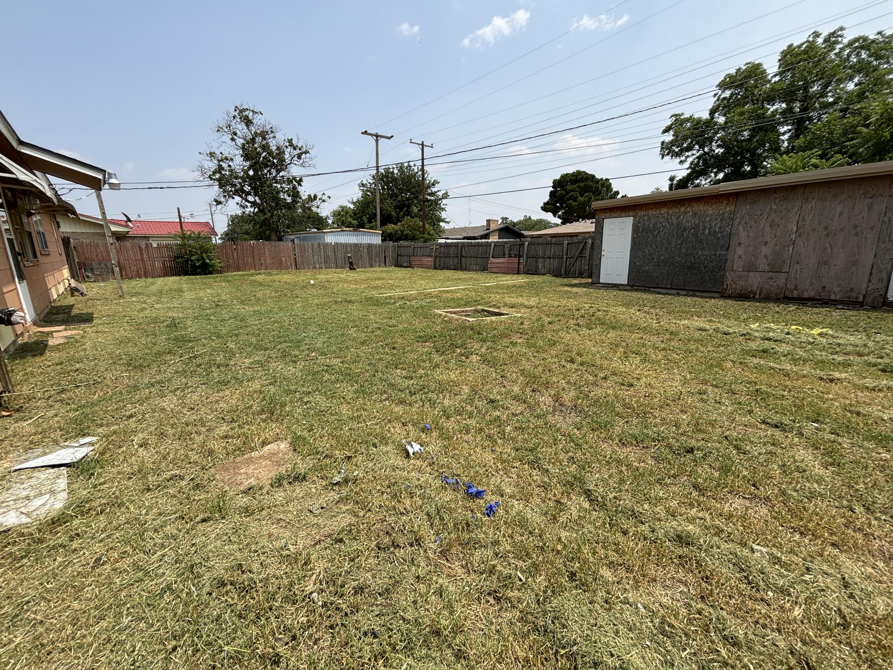 1303 46th Street Lubbock, TX 79412 - Photo 13 of 13 a view of a backyard