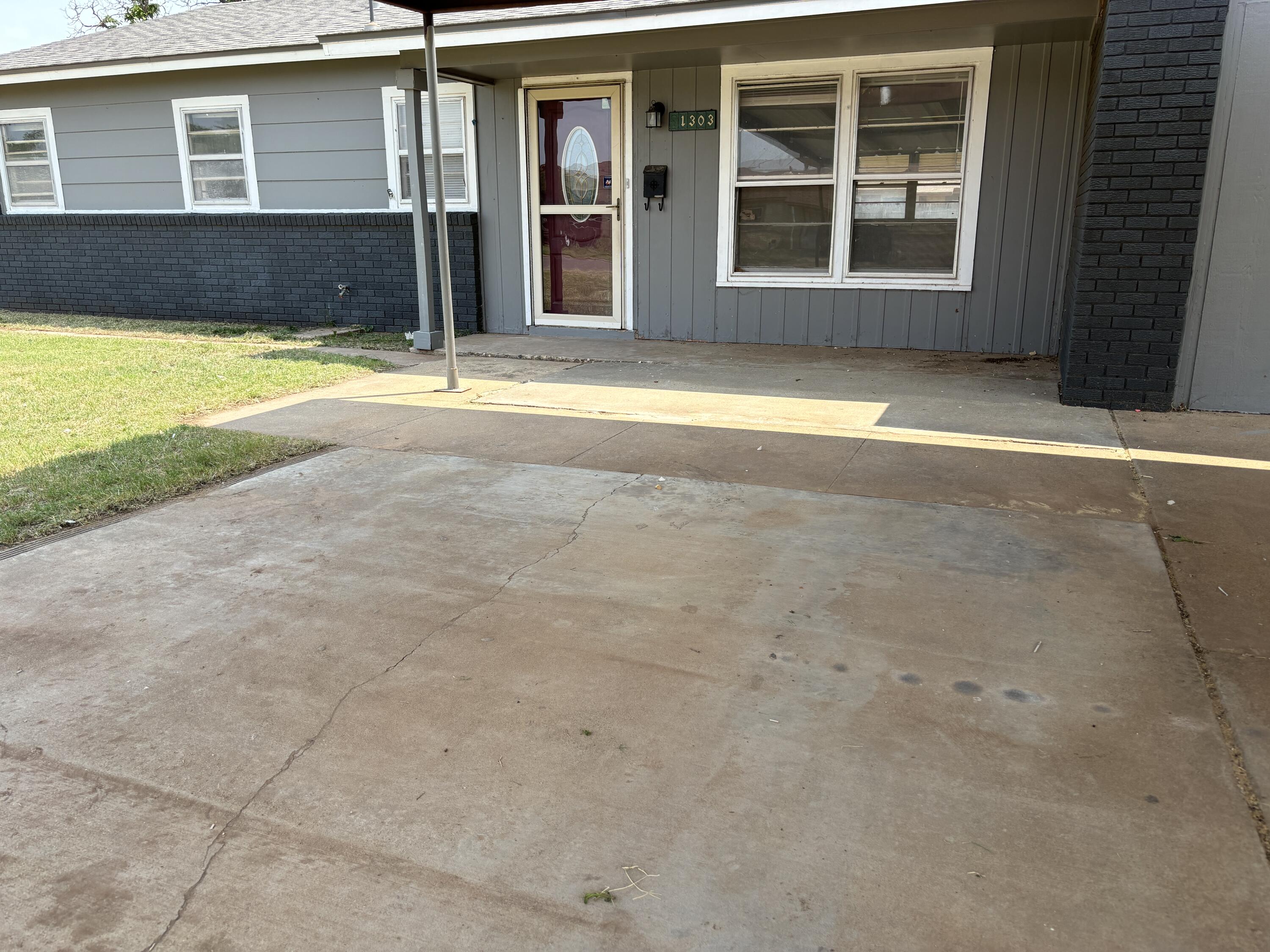 1303 46th Street Lubbock, TX 79412 - Photo 2 of 13 a view of swimming pool of the house