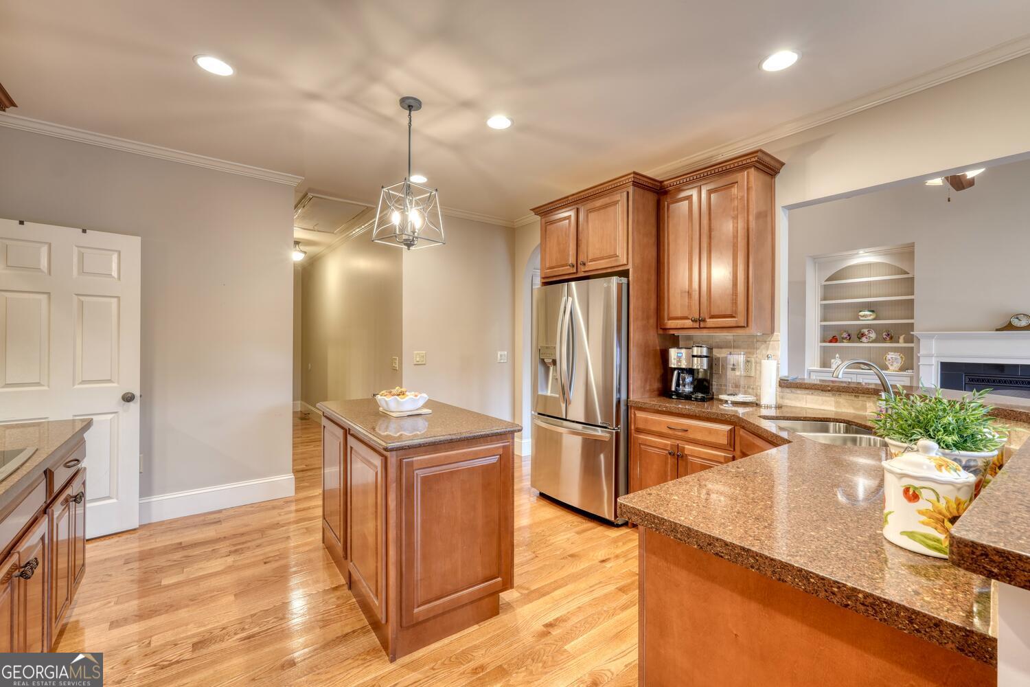 178 Barnwood Road Blairsville, GA 30512 - Photo 26 of 66 a kitchen with stainless steel appliances granite countertop a sink and a refrigerator