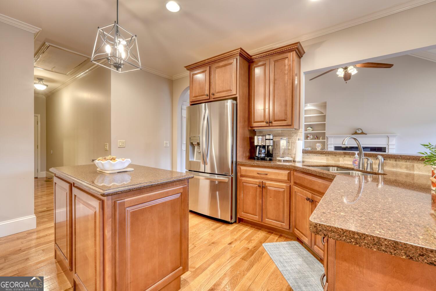 178 Barnwood Road Blairsville, GA 30512 - Photo 30 of 66 a kitchen with stainless steel appliances granite countertop a sink refrigerator stove and microwave