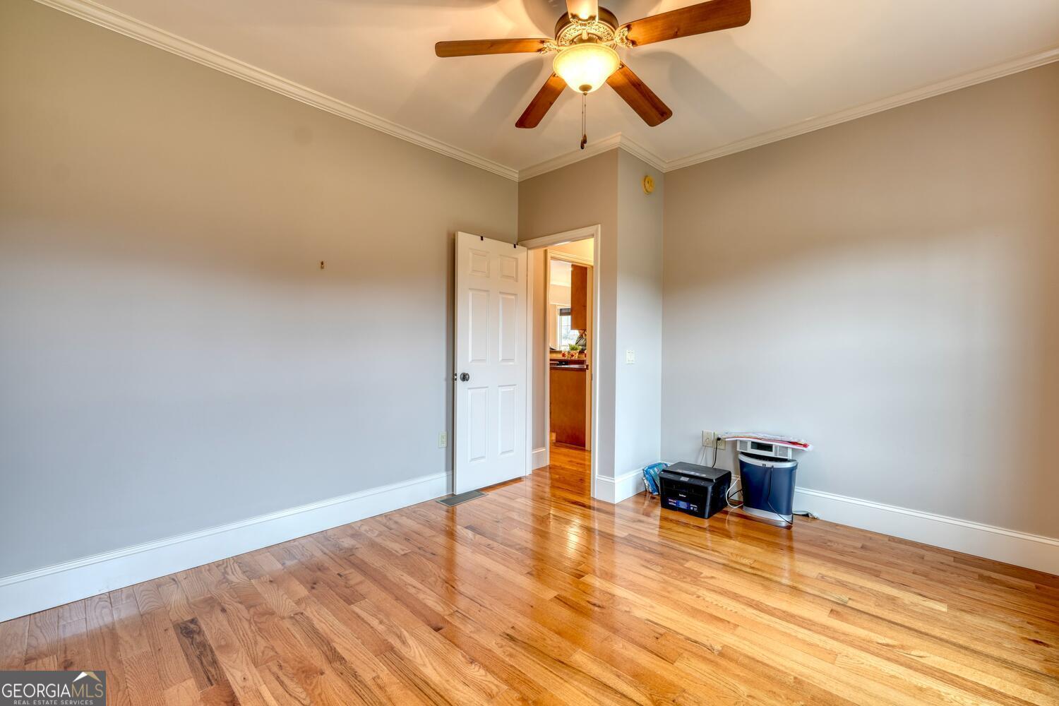 178 Barnwood Road Blairsville, GA 30512 - Photo 38 of 66 a view of an empty room with window and wooden floor