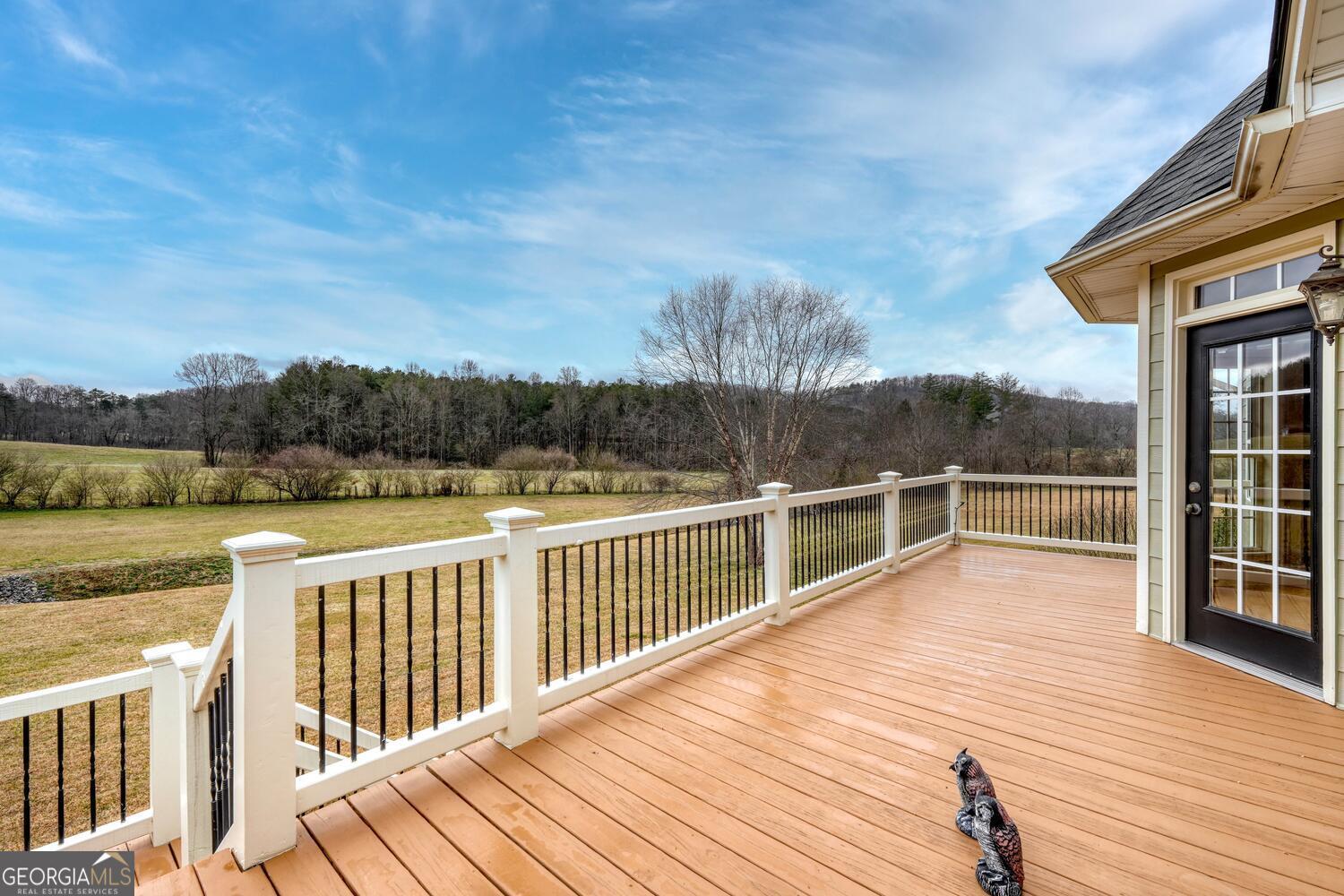 178 Barnwood Road Blairsville, GA 30512 - Photo 53 of 66 a view of a balcony with wooden floor and fence