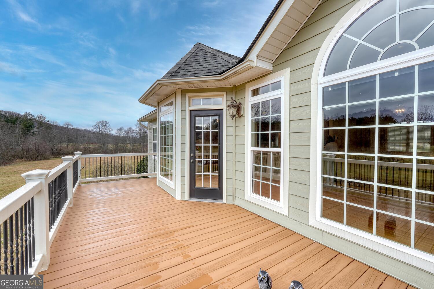 178 Barnwood Road Blairsville, GA 30512 - Photo 54 of 66 a view of a balcony with wooden floor and fence