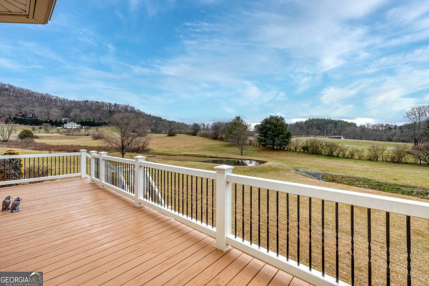 178 Barnwood Road Blairsville, GA 30512 - Photo 55 of 66 a view of balcony with wooden floor and city view