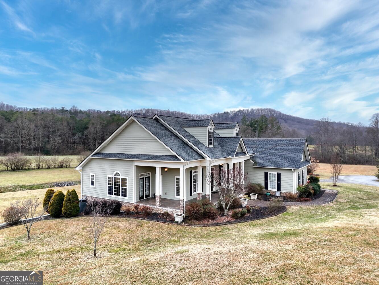 178 Barnwood Road Blairsville, GA 30512 - Photo 59 of 66 a view of a house with a big yard and balcony