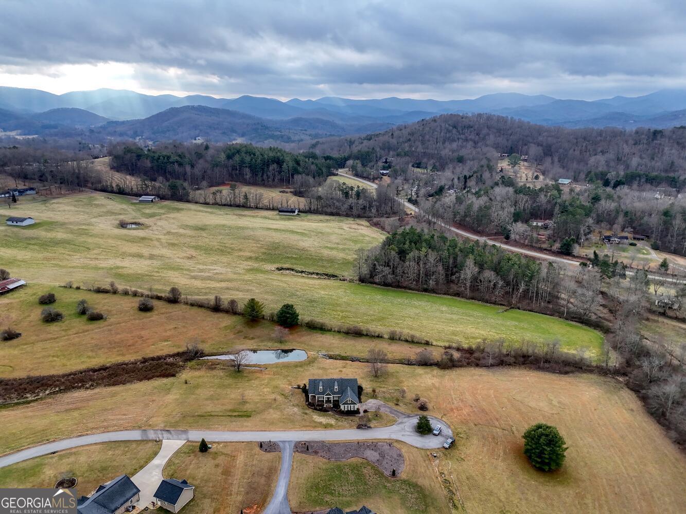 178 Barnwood Road Blairsville, GA 30512 - Photo 62 of 66 a view of a lake with a mountain