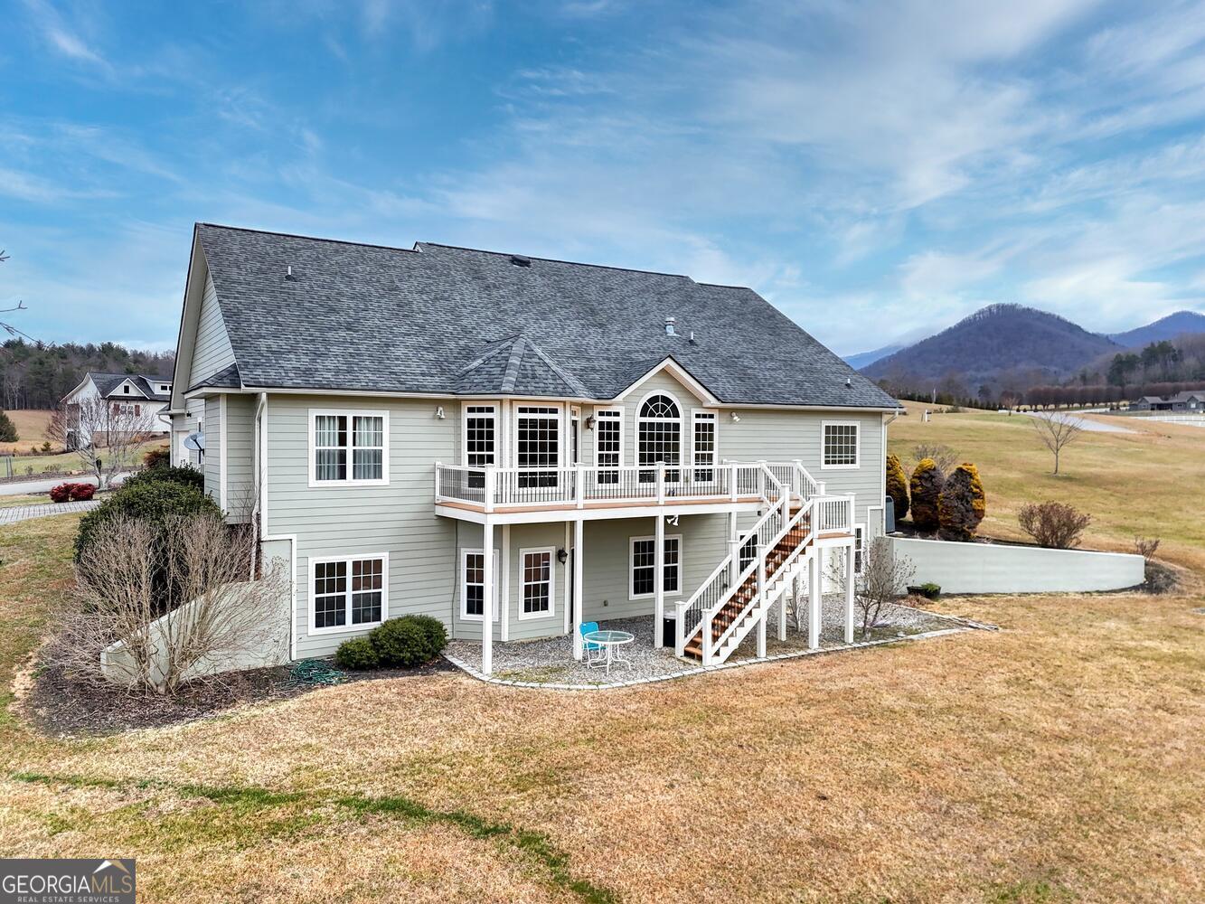 178 Barnwood Road Blairsville, GA 30512 - Photo 7 of 66 a view of a house with a yard and sitting area