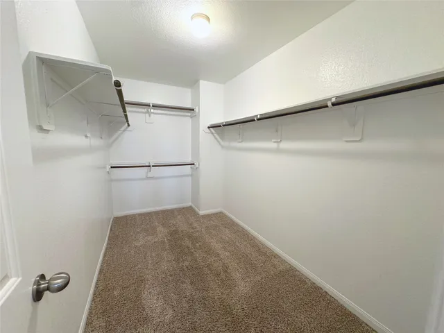 a view of a walk in closet