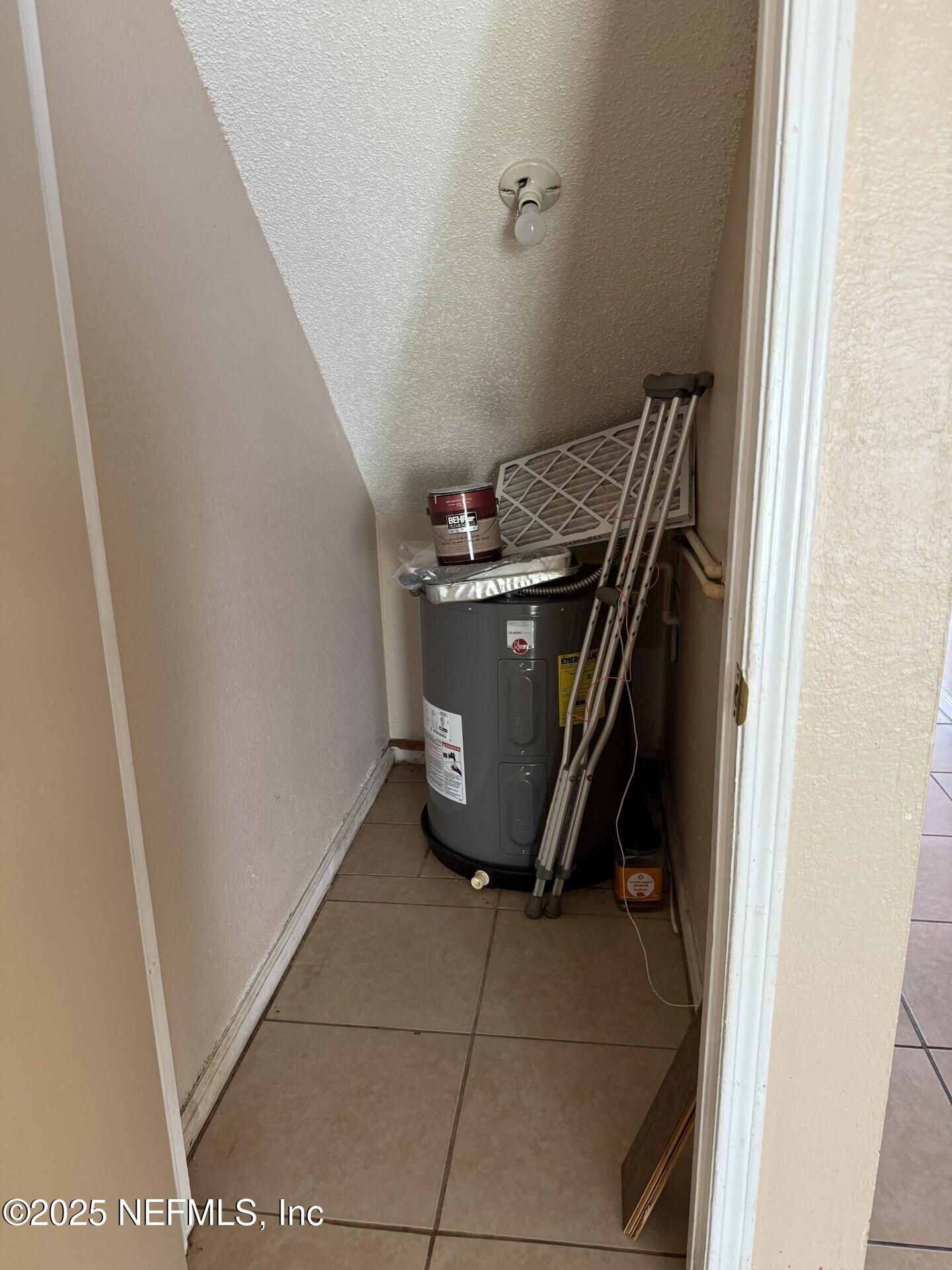 791 Assisi Lane, Unit 803 Jacksonville, FL 32233 - Photo 14 of 15 a view of water heater room