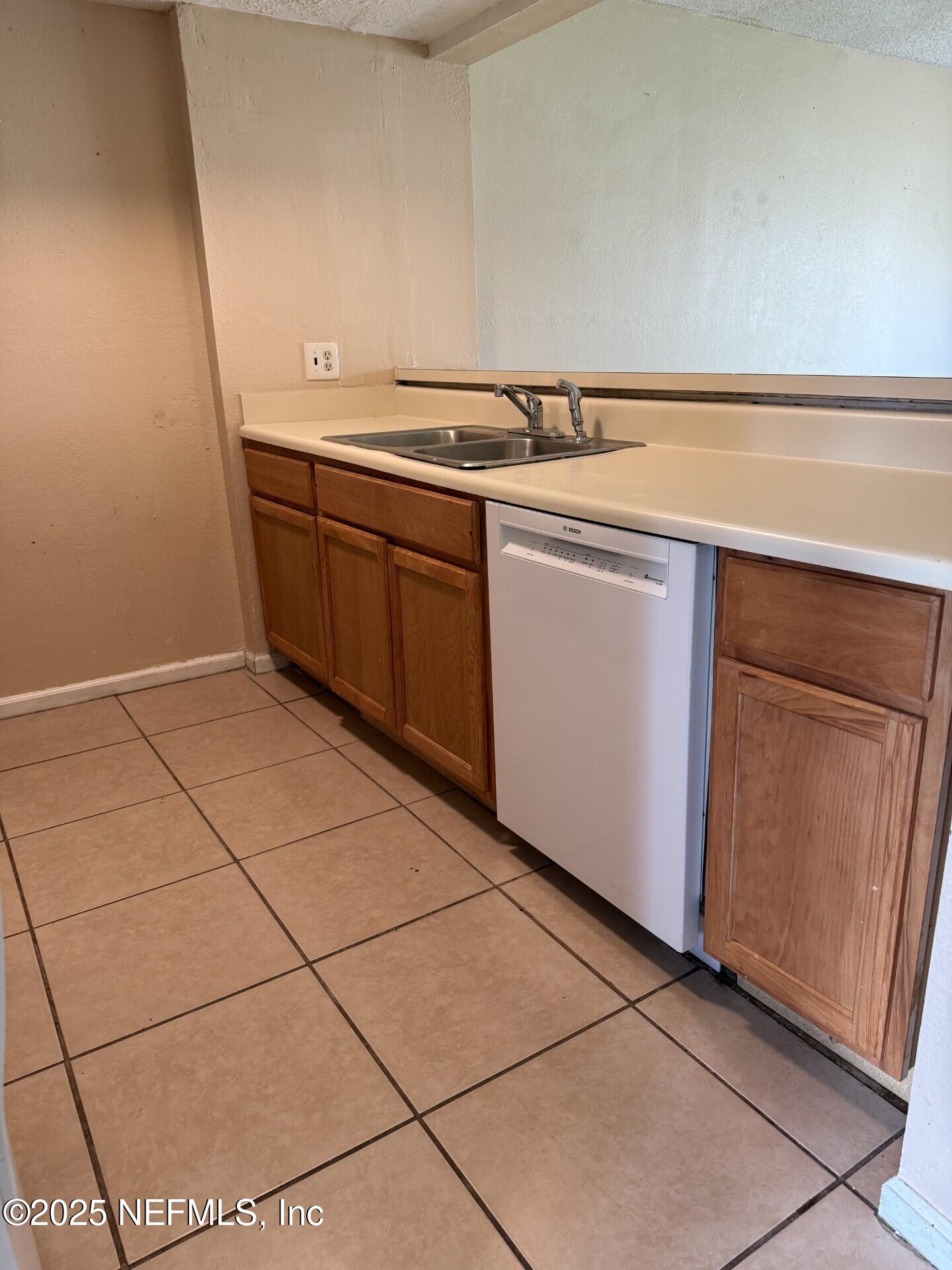791 Assisi Lane, Unit 803 Jacksonville, FL 32233 - Photo 3 of 15 a utility room with dryer and washer