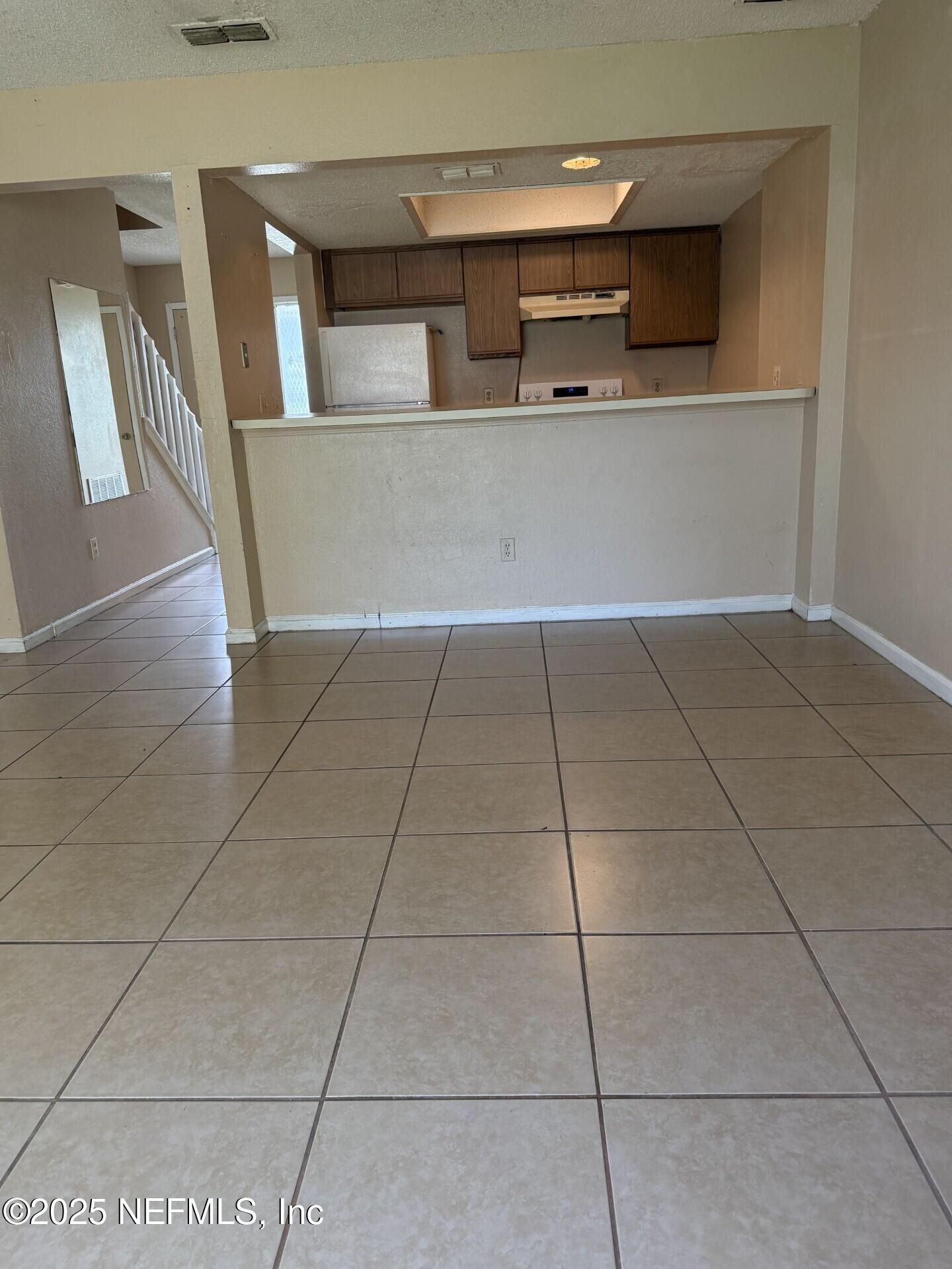 791 Assisi Lane, Unit 803 Jacksonville, FL 32233 - Photo 4 of 15 a view of washer and dryer