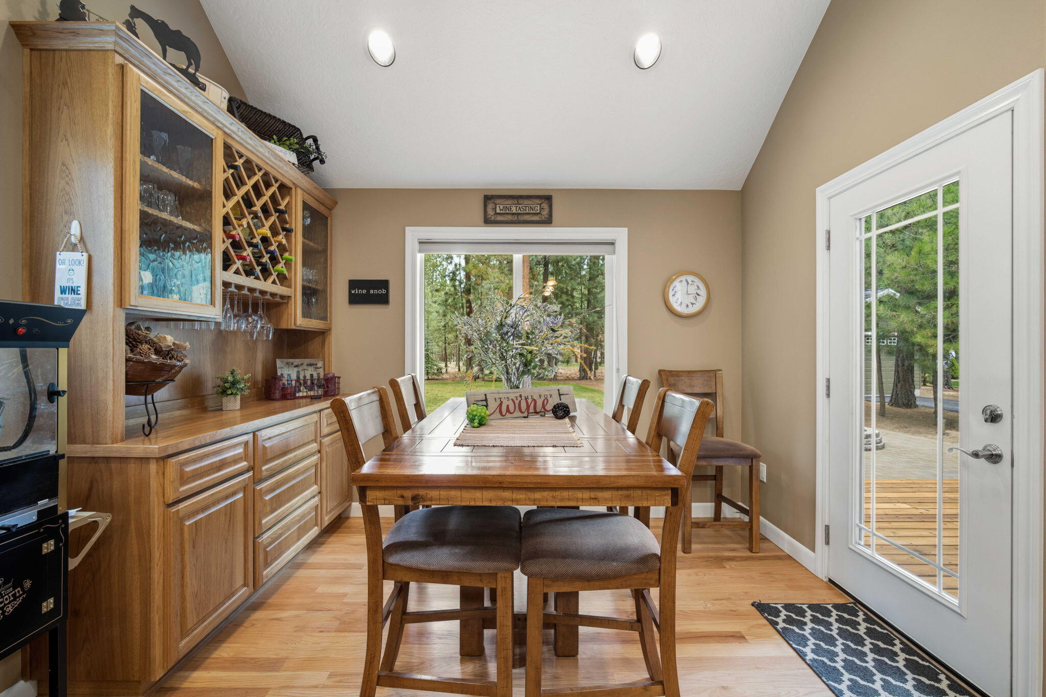 14234 Whitewater Loop La Pine, OR 97739 - Photo 15 of 62 Eating area with an oversized window overlooking the back yard and deck access.