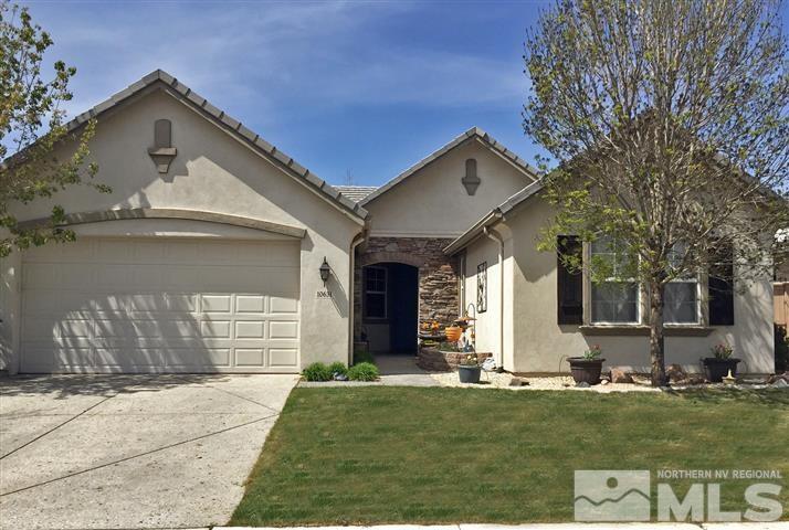 10631 Fort Morgan Way Reno, NV 89521 - Photo 1 of 1 front view of a house with a yard