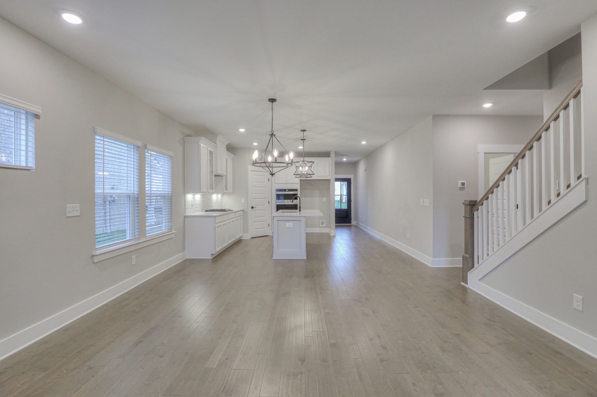 724 Castle Road Mount Juliet, TN 37122 - Photo 20 of 52 a view of an empty room with kitchen and window