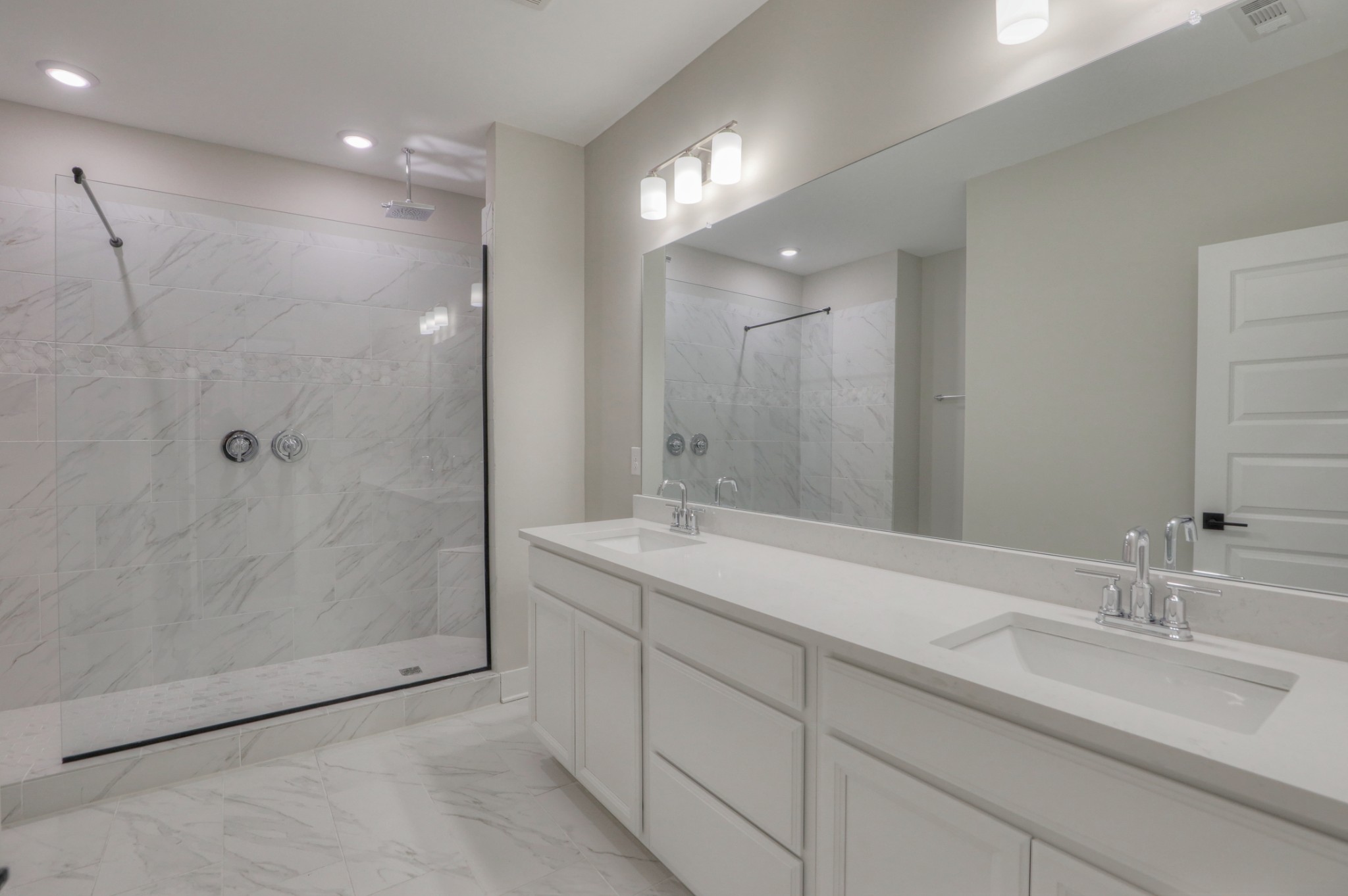 724 Castle Road Mount Juliet, TN 37122 - Photo 29 of 52 a bathroom with a double vanity sink mirror and shower