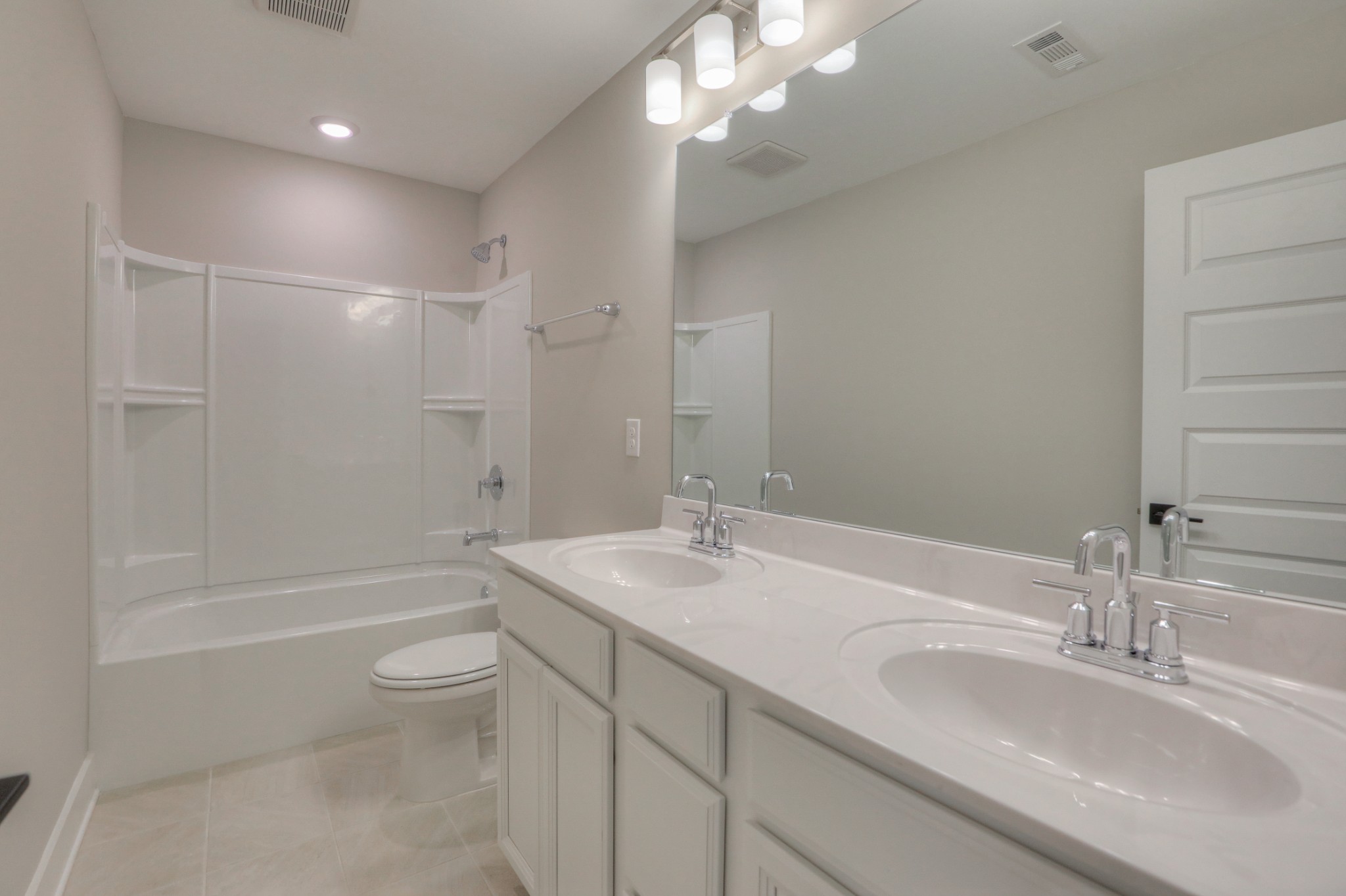 724 Castle Road Mount Juliet, TN 37122 - Photo 40 of 52 a bathroom with a granite countertop sink a toilet and bathtub