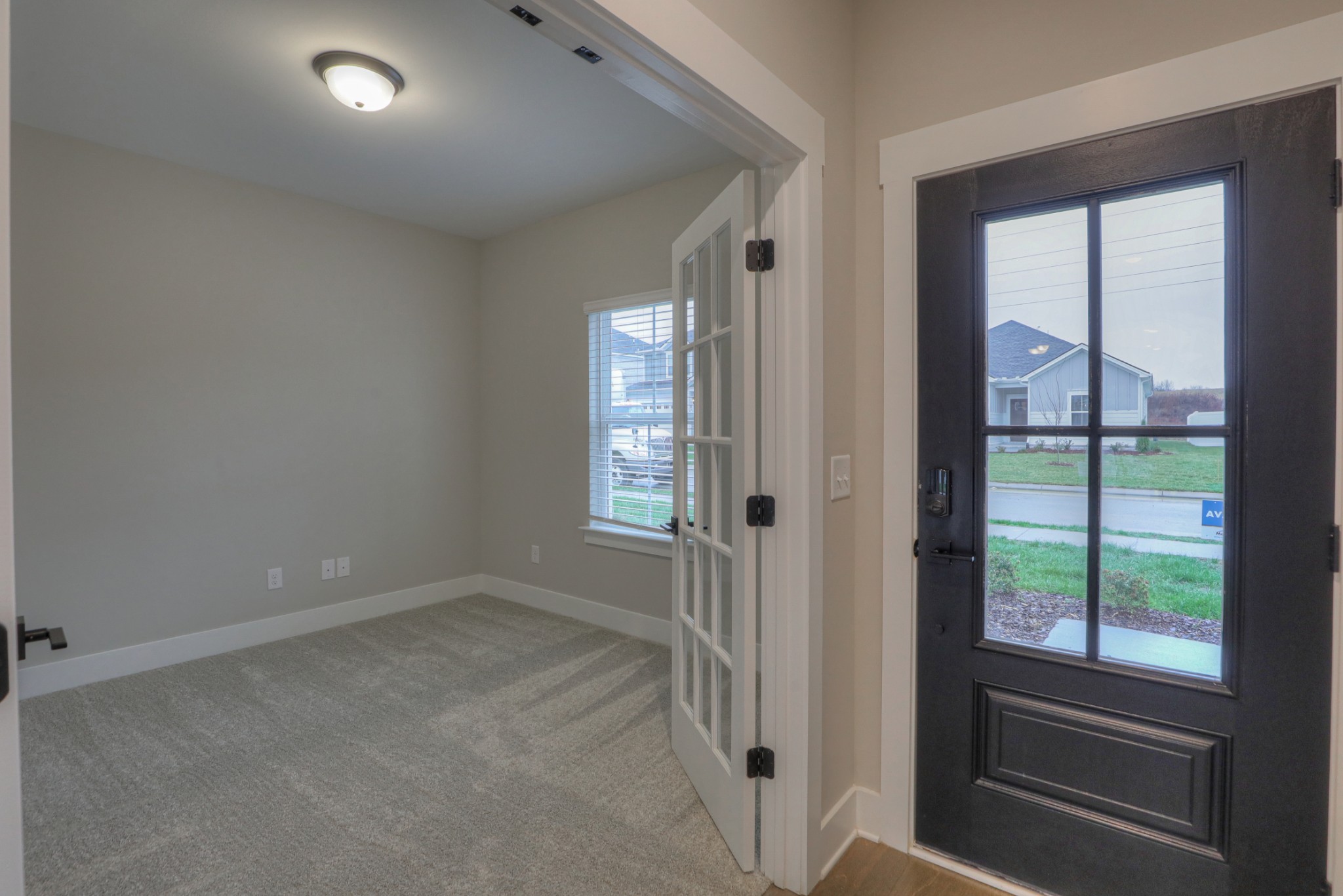 724 Castle Road Mount Juliet, TN 37122 - Photo 5 of 52 an empty room with windows