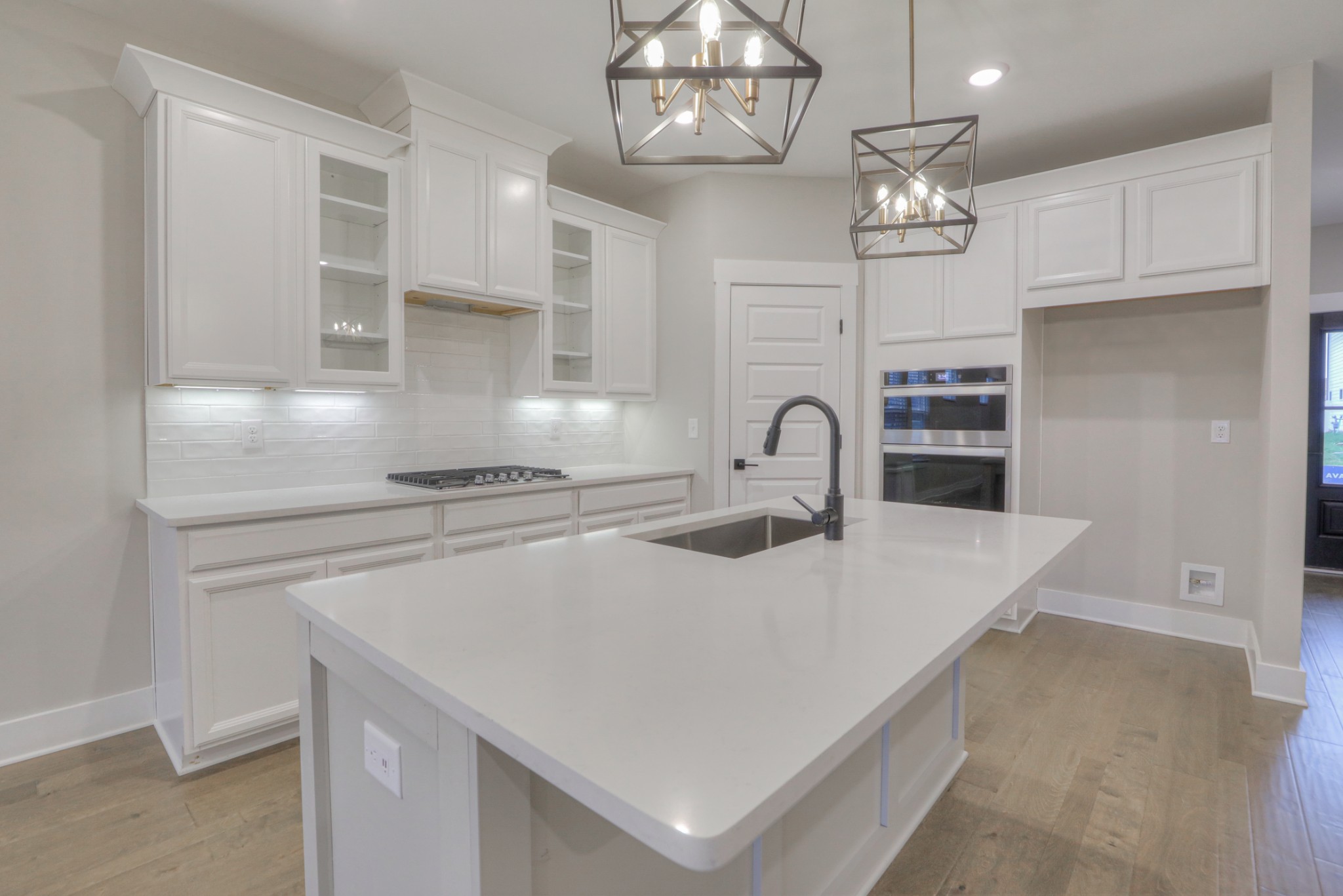 724 Castle Road Mount Juliet, TN 37122 - Photo 10 of 52 a kitchen with a stove a refrigerator and a sink