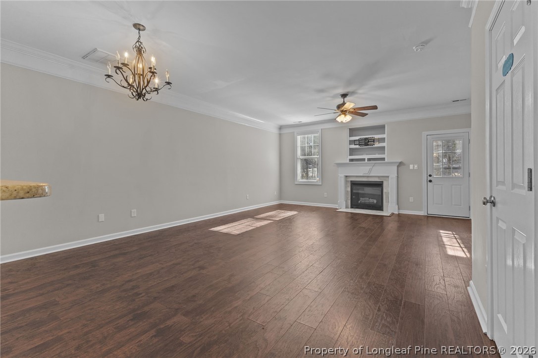 342 Bahama Loop Fayetteville, NC 28314 - Photo 12 of 47 a view of empty room with wooden floor and fireplace