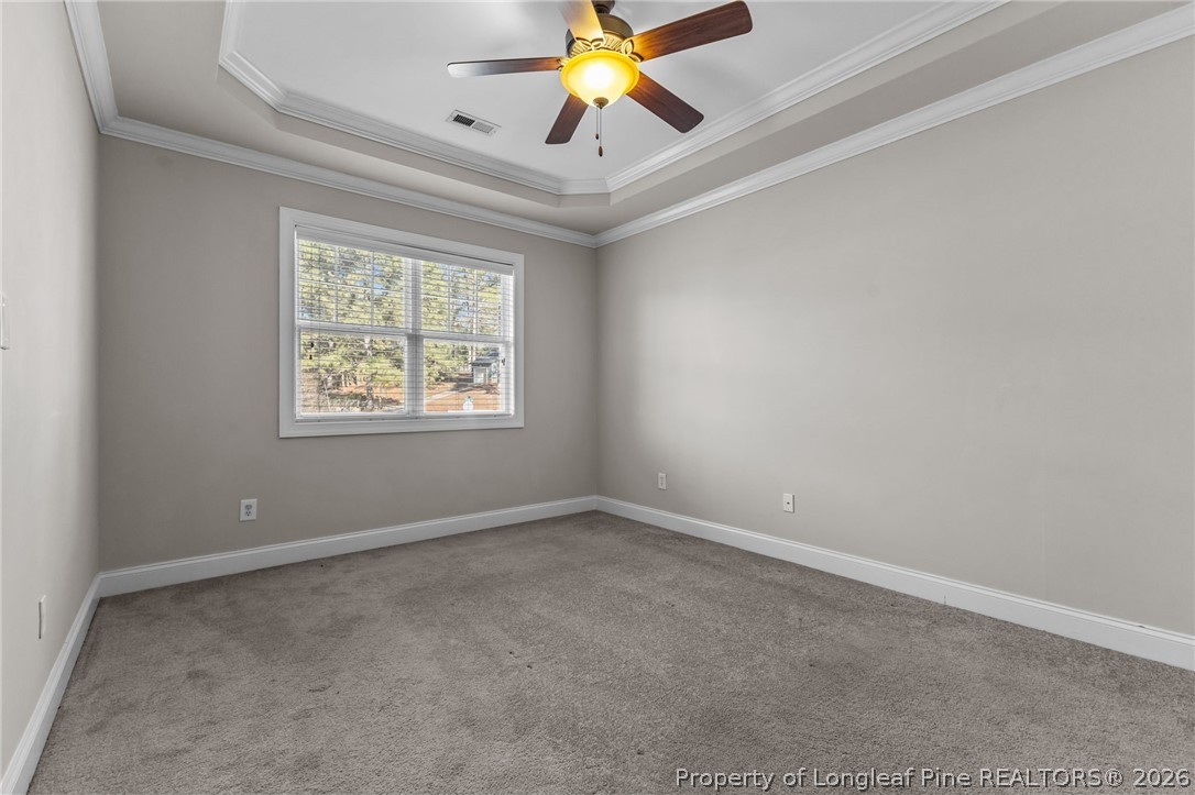 342 Bahama Loop Fayetteville, NC 28314 - Photo 26 of 47 an empty room with a window and a ceiling fan