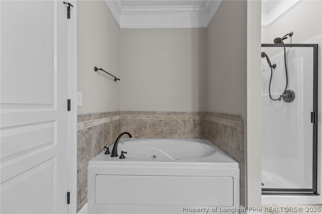342 Bahama Loop Fayetteville, NC 28314 - Photo 29 of 47 a bathroom with a bathtub