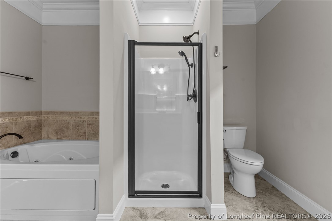 342 Bahama Loop Fayetteville, NC 28314 - Photo 30 of 47 a bathroom with a granite countertop bathtub shower and toilet