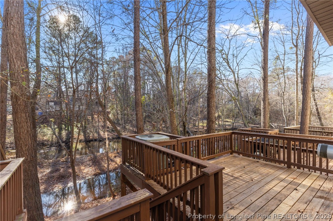342 Bahama Loop Fayetteville, NC 28314 - Photo 37 of 47 a view of balcony with wooden floor and fence