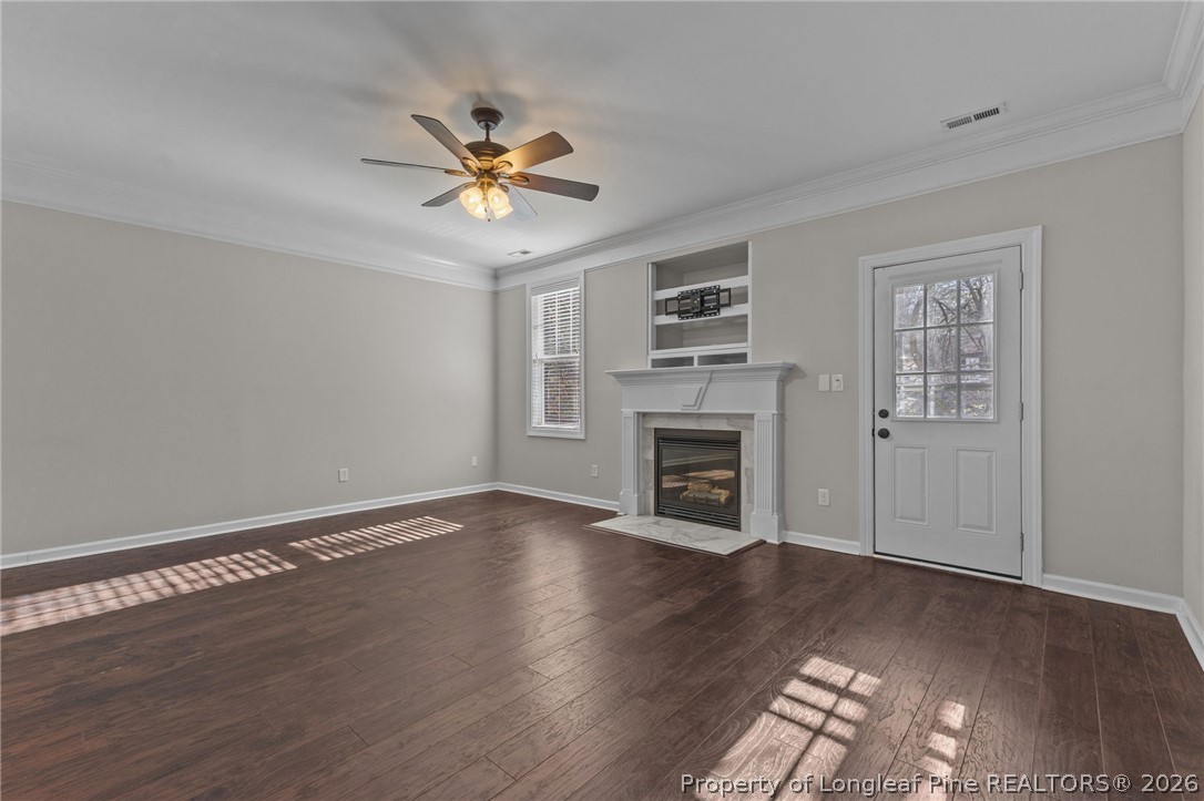 342 Bahama Loop Fayetteville, NC 28314 - Photo 6 of 47 a view of empty room with wooden floor and fan