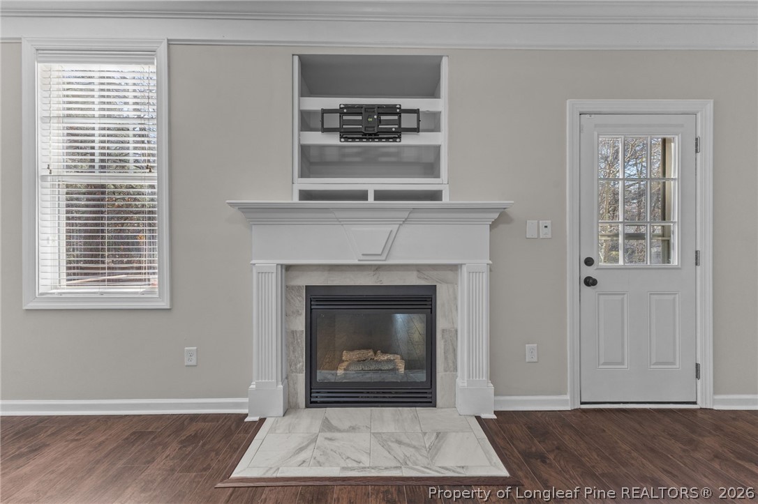 342 Bahama Loop Fayetteville, NC 28314 - Photo 8 of 47 a living room with a fireplace and a window