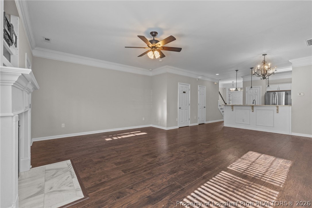 342 Bahama Loop Fayetteville, NC 28314 - Photo 9 of 47 a view of a livingroom with a chandelier fan and wooden floor