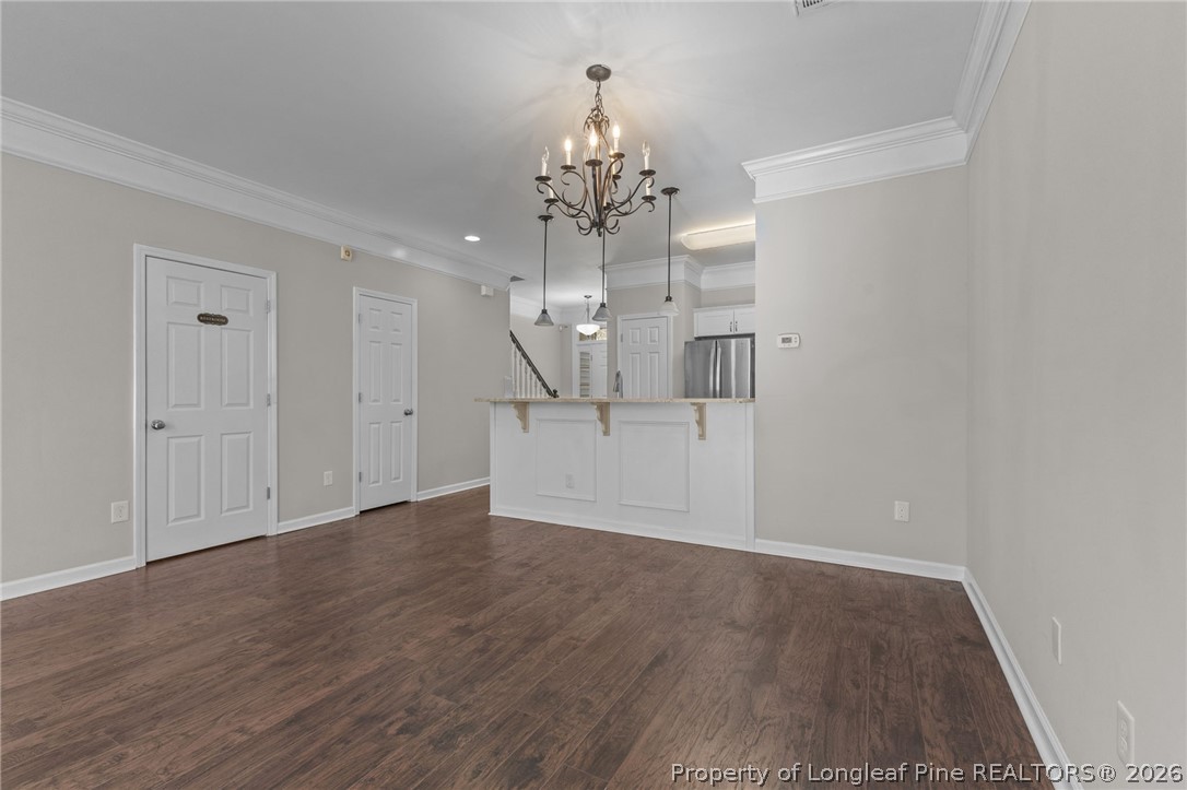 342 Bahama Loop Fayetteville, NC 28314 - Photo 10 of 47 wooden floor in an empty room with a window
