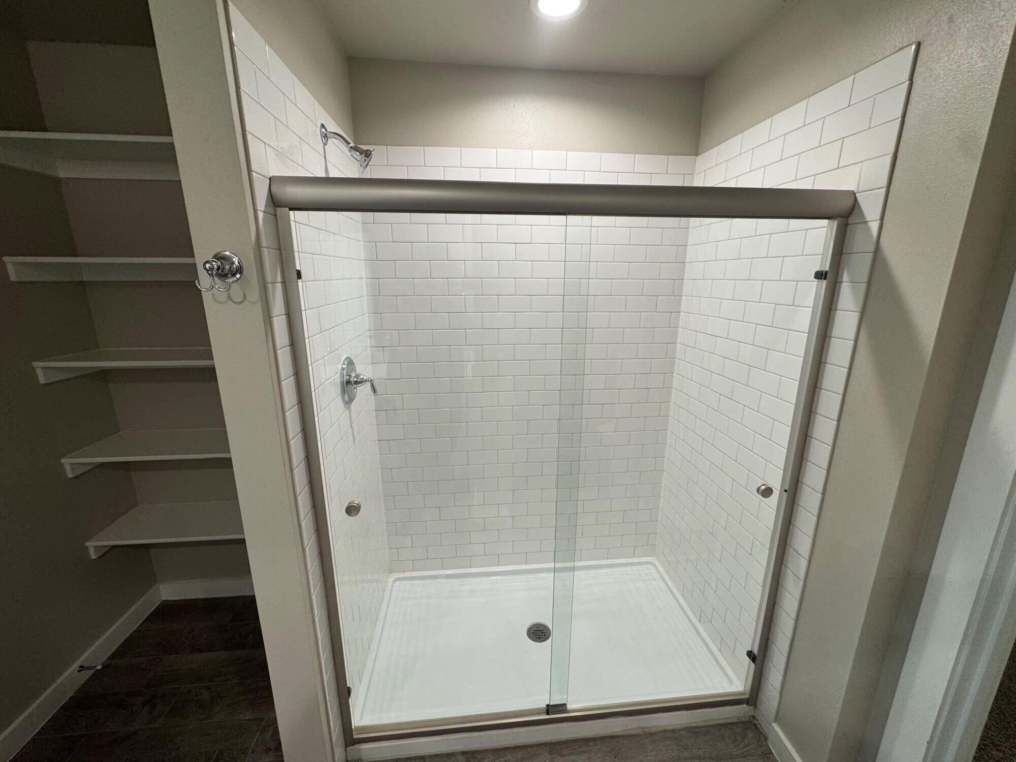 4701 126th Street Lubbock, TX 79424 - Photo 13 of 13 a bathroom with a glass door shower