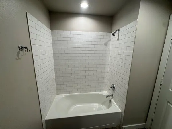 a bathroom with a bathtub