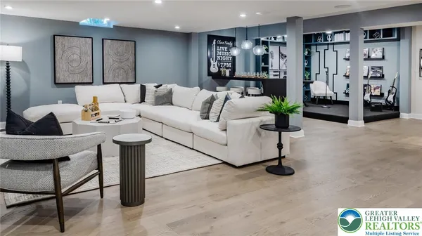 a bathroom with a toilet a sink and bathtub