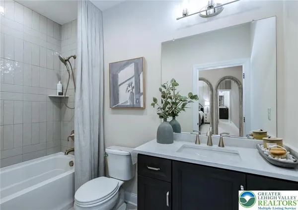 a utility room with sink dryer and washer