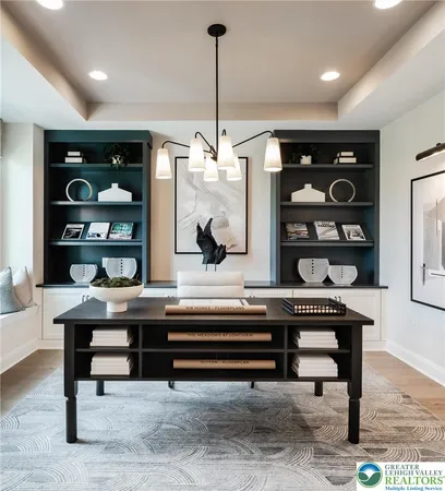 a view of hall way with furniture