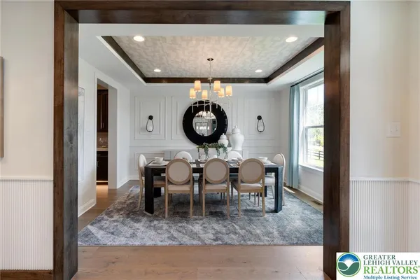 a view of a hallway with seating area