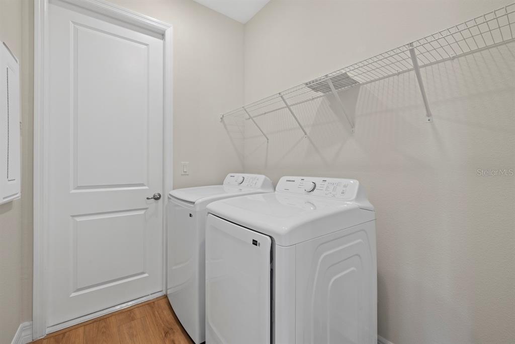 3883 Dominic Street North Port, FL 34288 - Photo 24 of 24 a utility room with dryer and washer