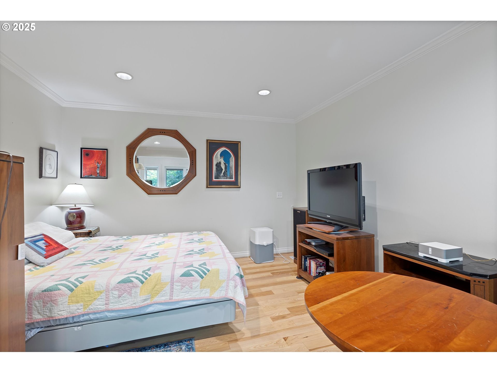 1757 Southwest Prospect Drive Portland, OR 97201 - Photo 13 of 48 a bedroom with a bed and a flat screen tv