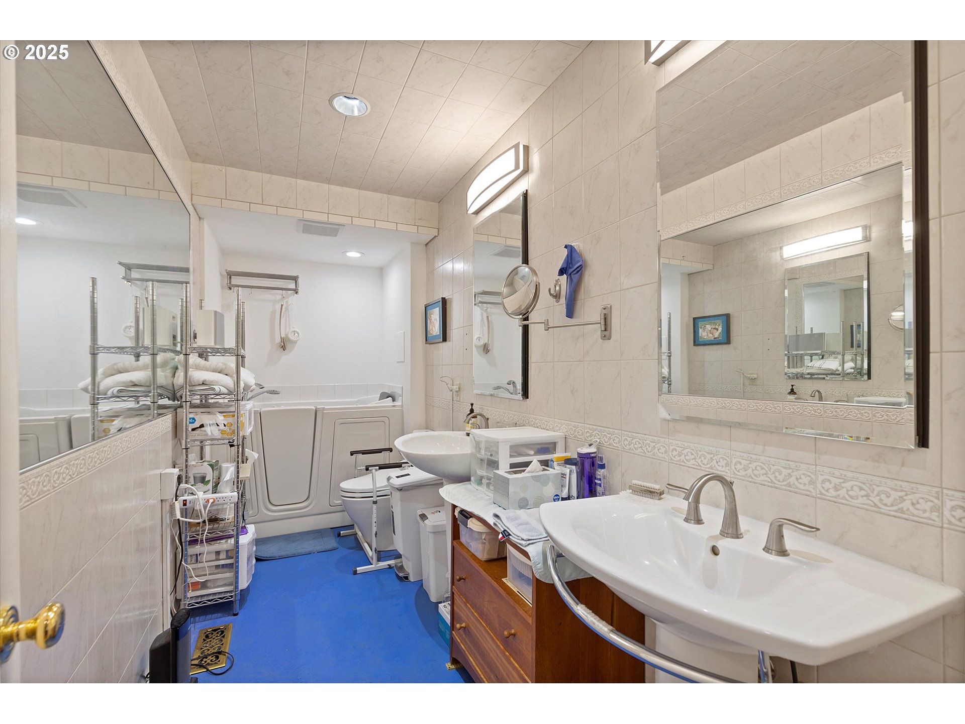 1757 Southwest Prospect Drive Portland, OR 97201 - Photo 16 of 48 a bathroom with a sink mirror and vanity
