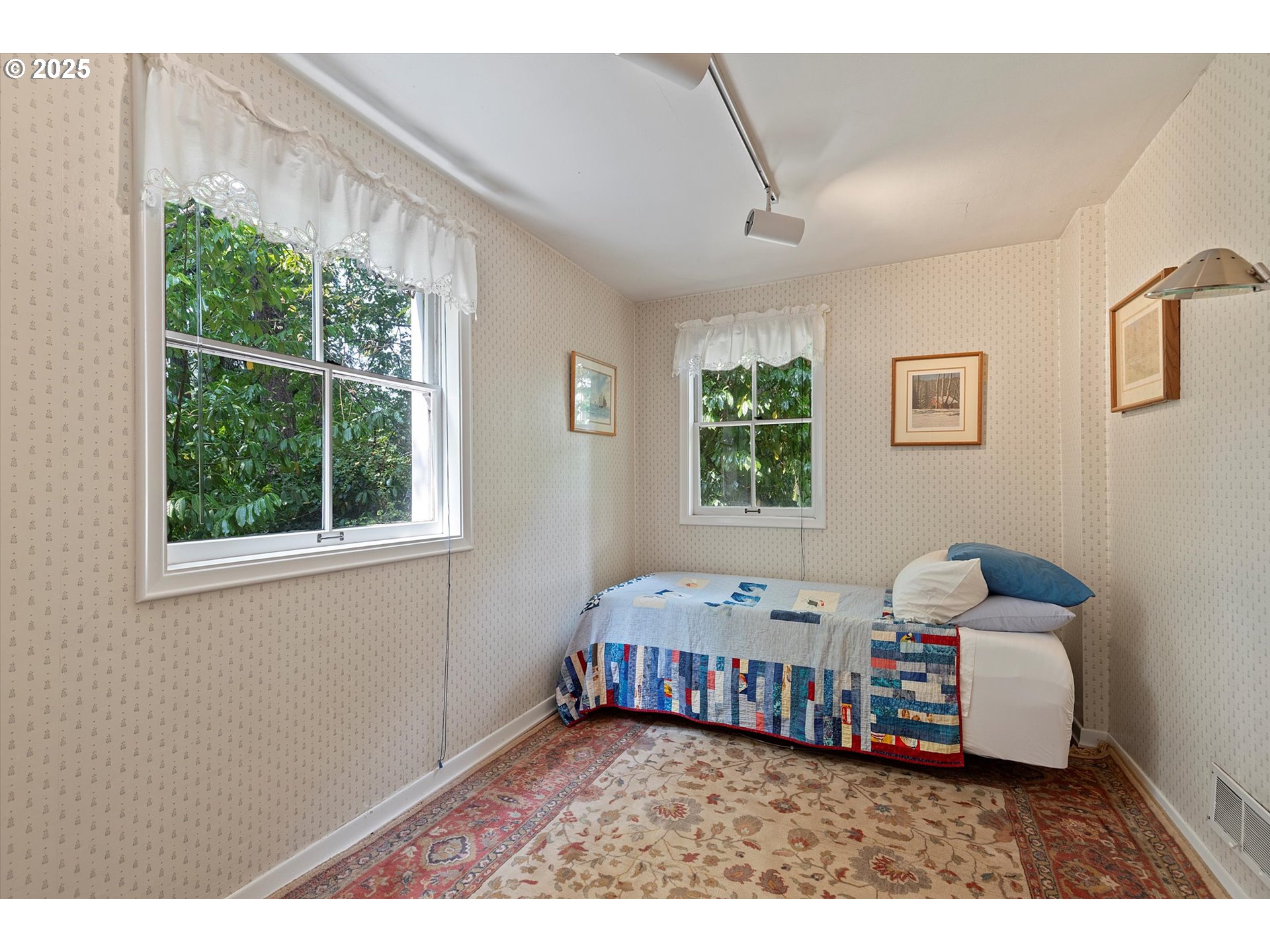 1757 Southwest Prospect Drive Portland, OR 97201 - Photo 28 of 48 a bedroom with furniture and a window