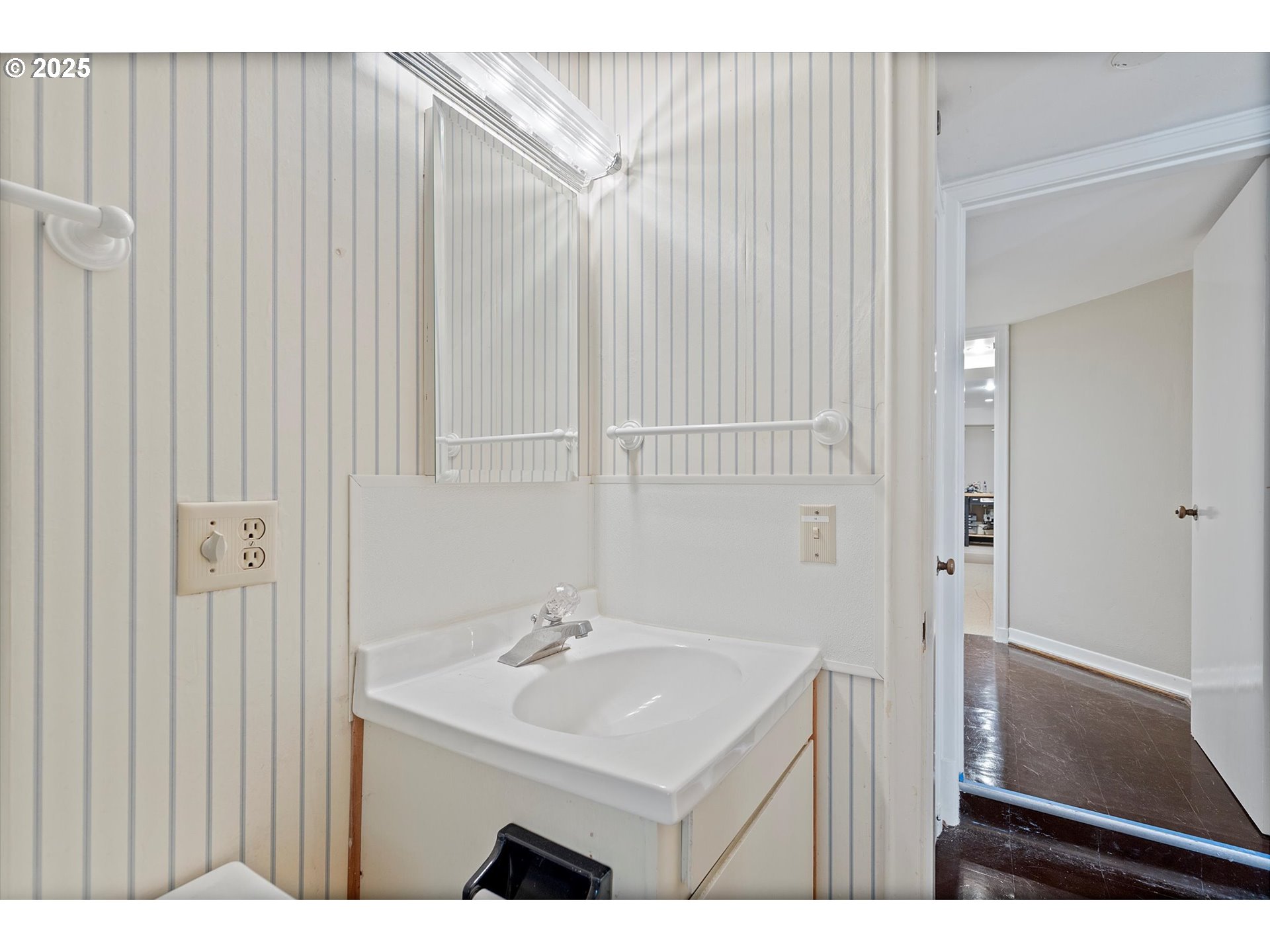 1757 Southwest Prospect Drive Portland, OR 97201 - Photo 31 of 48 a bathroom with a sink a mirror and a toilet
