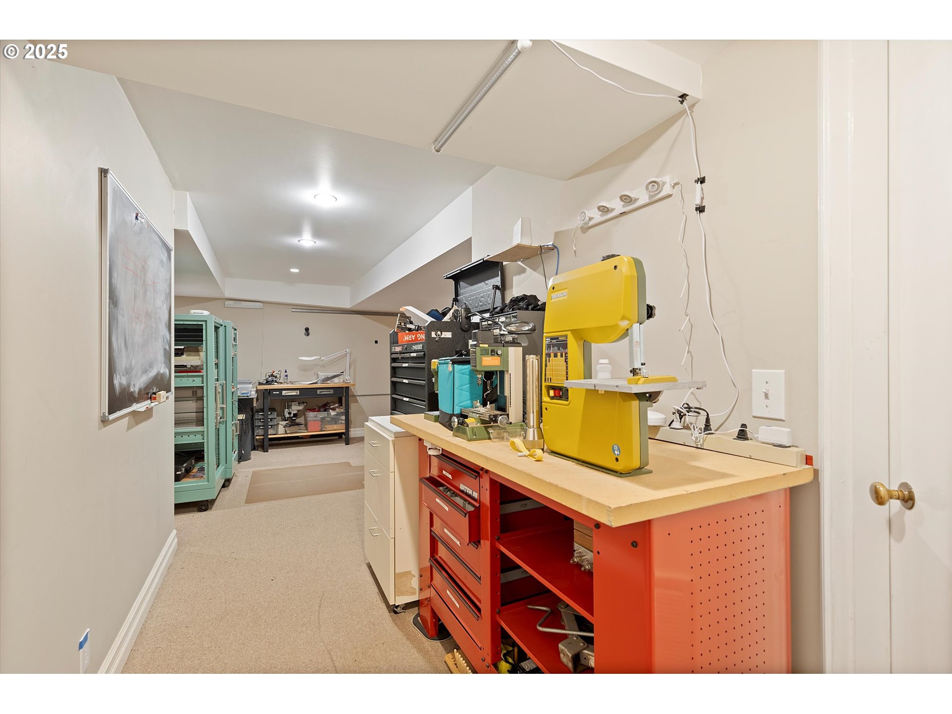 1757 Southwest Prospect Drive Portland, OR 97201 - Photo 32 of 48 a kitchen with a sink appliances and a dining table