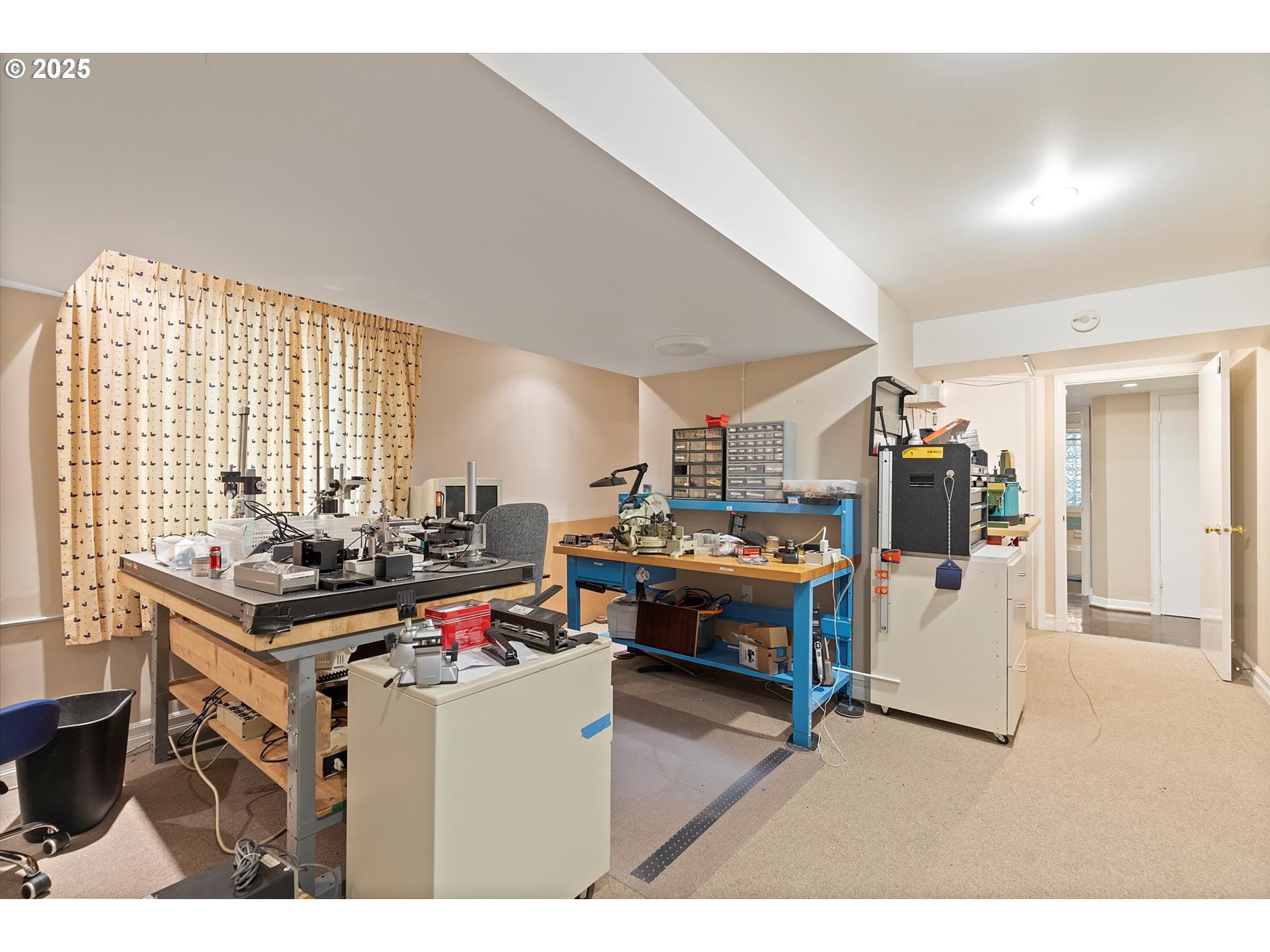 1757 Southwest Prospect Drive Portland, OR 97201 - Photo 33 of 48 a living room with furniture and a flat screen tv
