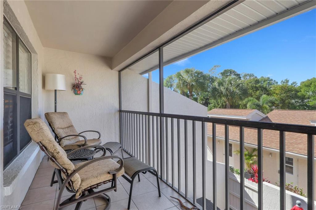 406 Foxtail Court, Unit 406 Naples, FL 34104 - Photo 25 of 42 a view of a balcony with furniture