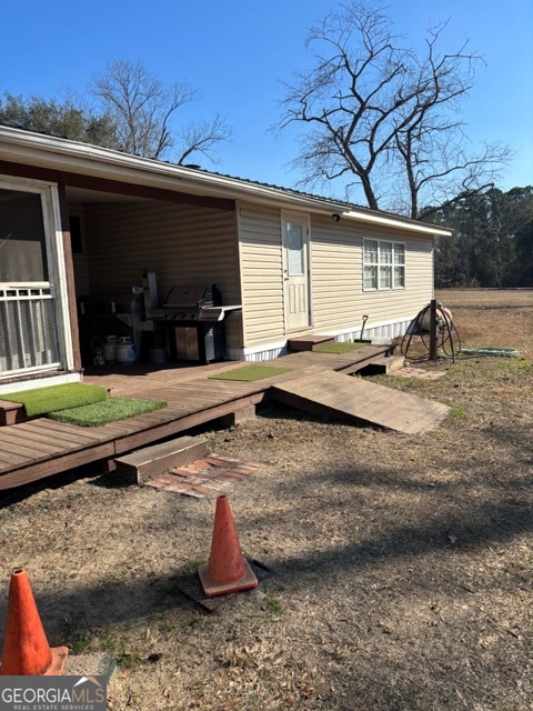 592 Clifford Meeks Road Collins, GA 30421 - Photo 22 of 52 a view of a house with backyard