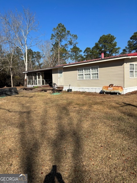 592 Clifford Meeks Road Collins, GA 30421 - Photo 25 of 52 front view of house with a yard