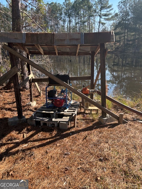 592 Clifford Meeks Road Collins, GA 30421 - Photo 38 of 52 a view of a house with a park