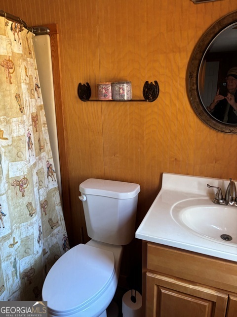 592 Clifford Meeks Road Collins, GA 30421 - Photo 8 of 52 a bathroom with a toilet and a sink